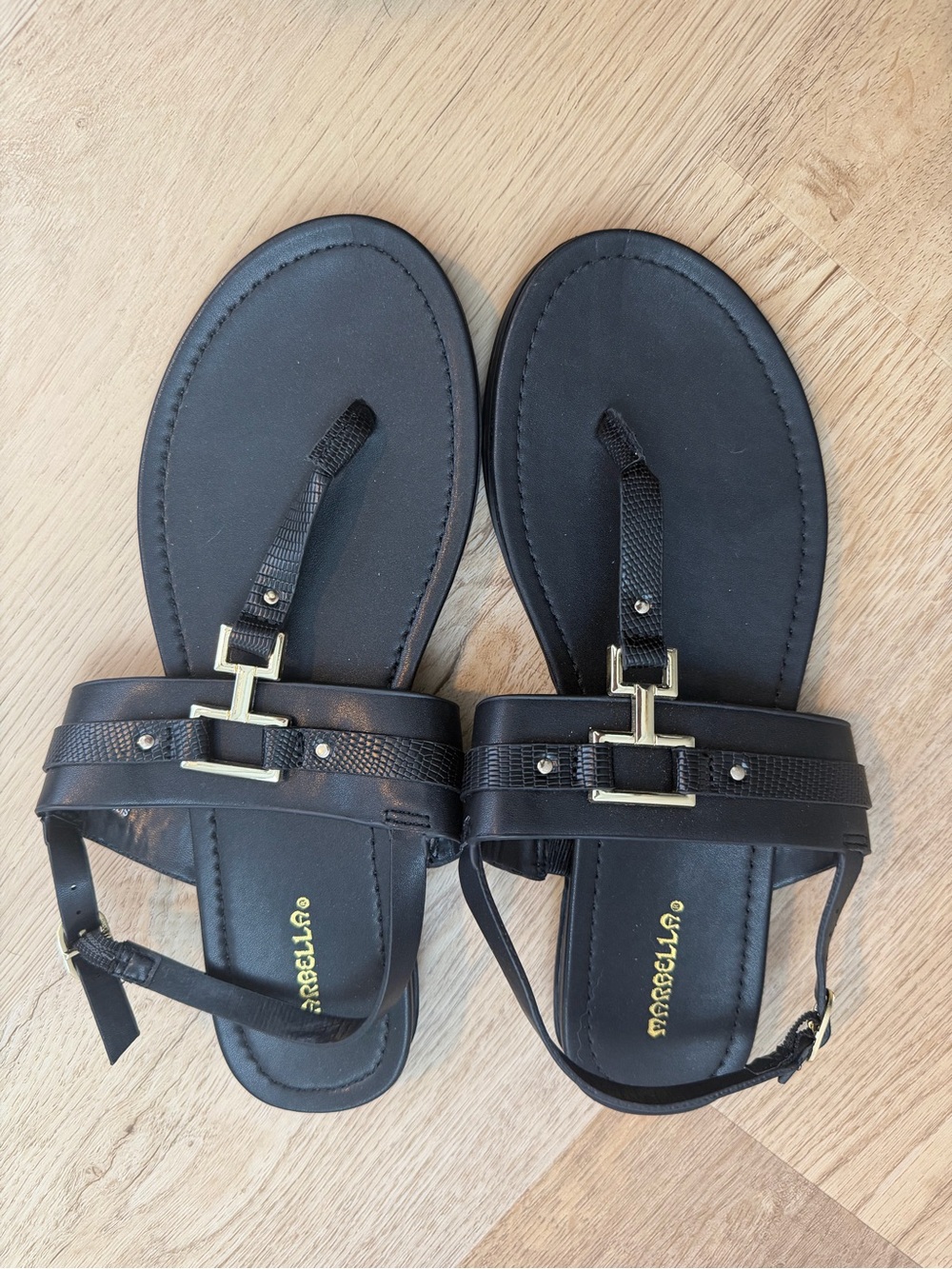 Black Women’s T-Strap Sandals with Gold Hardware